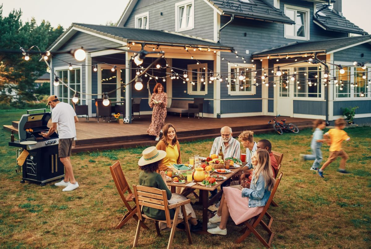 Big Family and Friends Celebrating Outside at their Backyard